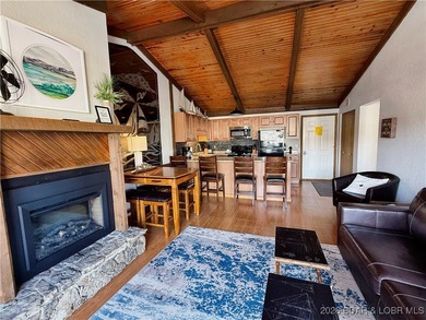 Enjoy lake living at its best in this beautifully maintained