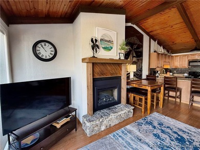 Enjoy lake living at its best in this beautifully maintained