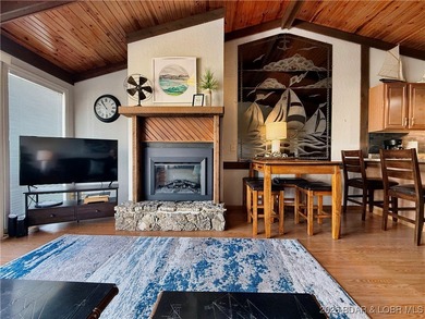 Enjoy lake living at its best in this beautifully maintained