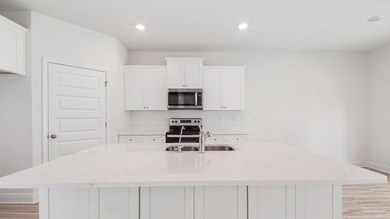 Welcome to the Carol Plan in Fallschase at Pathstone! Just under - photo 3