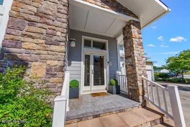 This amazingly luxurious three-bedroom townhome is set for - photo 5