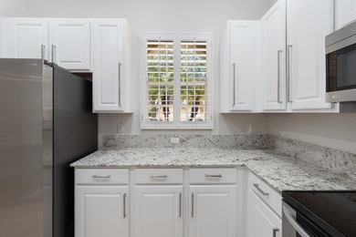 Welcome to this charming CORNER UNIT 2-bedroom, 2-bathroom villa - photo 15