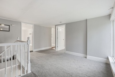 Completely reimagined in 2019, this riverfront retreat blends - photo 13