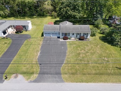 Discover your new home at 1078 Five Mile Line Rd., nestled on a - photo 4