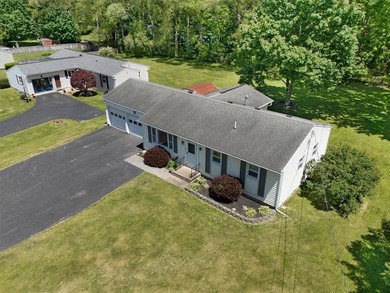 Discover your new home at 1078 Five Mile Line Rd., nestled on a - photo 5