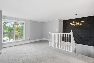 Completely reimagined in 2019, this riverfront retreat blends - photo 17