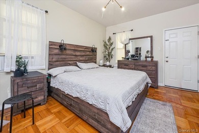 Don't miss this exceptional two-family home in the heart of the - photo 12