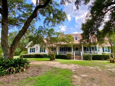 Lake Home For Sale in Carriere, Mississippi