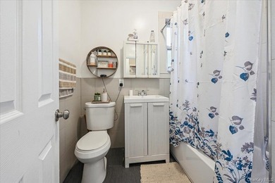 Don't miss this exceptional two-family home in the heart of the - photo 24
