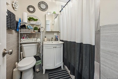 Don't miss this exceptional two-family home in the heart of the - photo 25