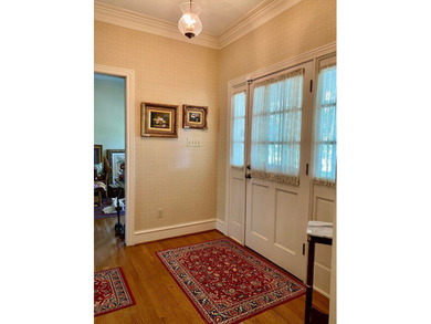 This beautiful home has it all! There is a sunroom with wet bar - photo 8