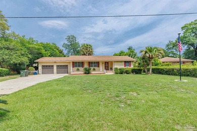 Welcome home to 902 N 75th Avenue, a charming property that - photo 1