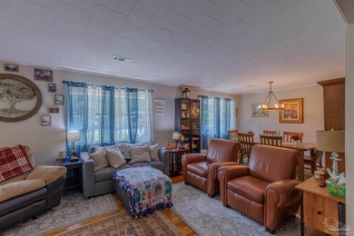 Welcome home to 902 N 75th Avenue, a charming property that - photo 8