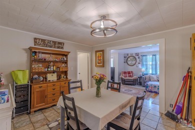 Welcome home to 902 N 75th Avenue, a charming property that - photo 9