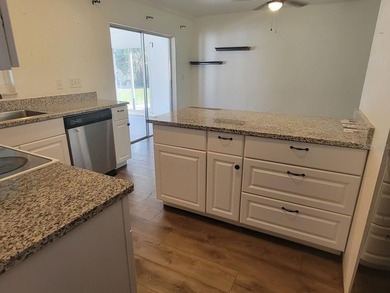 Bargain priced! This well-maintained 2-bedroom, 1.5-bathroom - photo 8