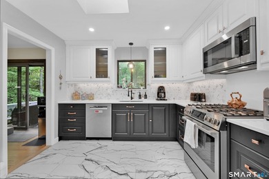 Welcome to 10 Candleview Drive, a beautifully renovated home in - photo 5