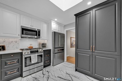 Welcome to 10 Candleview Drive, a beautifully renovated home in - photo 6