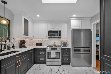 Welcome to 10 Candleview Drive, a beautifully renovated home in - photo 7