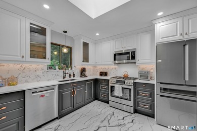 Welcome to 10 Candleview Drive, a beautifully renovated home in - photo 8