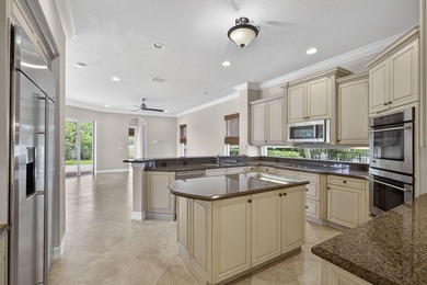 Located on a private cul-de-sac lakefront lot in the exclusive - photo 12