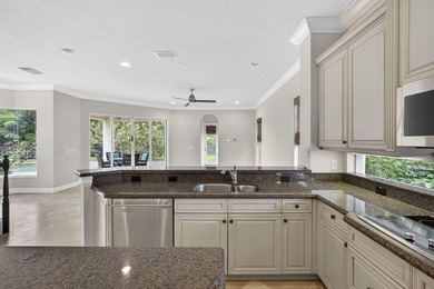 Located on a private cul-de-sac lakefront lot in the exclusive - photo 13