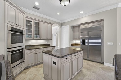 Located on a private cul-de-sac lakefront lot in the exclusive - photo 14