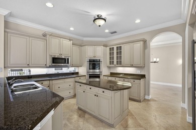 Located on a private cul-de-sac lakefront lot in the exclusive - photo 15