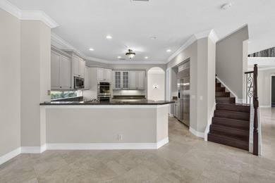 Located on a private cul-de-sac lakefront lot in the exclusive - photo 16