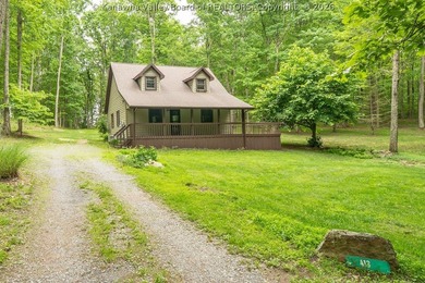 Totally updated throughout, this two-bedroom, two-bath cottage - photo 1