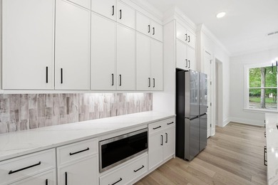 Brand-new construction in Harmony Township, a private Lowcountry - photo 14
