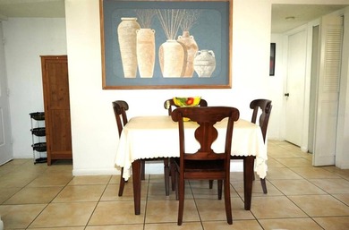 Welcome to this charming first-floor condo located at in Palm - photo 4
