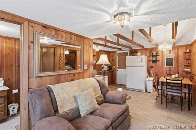Discover this unique 2-bedroom, 1-bath lakefront cabin offering - photo 17