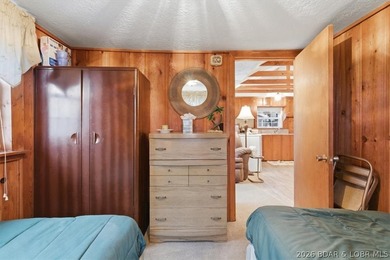 Discover this unique 2-bedroom, 1-bath lakefront cabin offering - photo 21