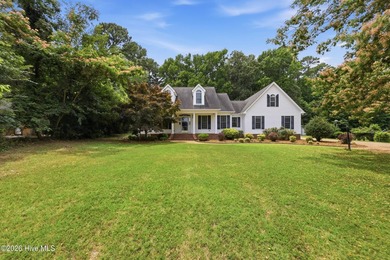 Lovely Cape Cod style home directly across the street from the - photo 1