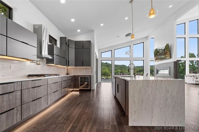 Luxury, location, and lake views come together in this stunning - photo 3