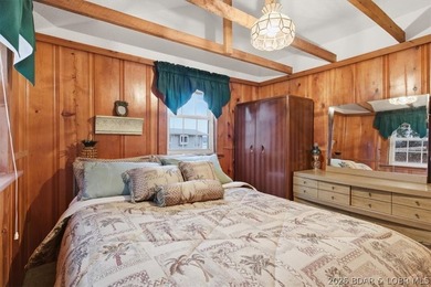 Discover this unique 2-bedroom, 1-bath lakefront cabin offering - photo 23
