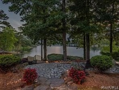 Experience elevated lakefront living on the pristine shores of - photo 3