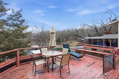 Discover this unique 2-bedroom, 1-bath lakefront cabin offering - photo 25