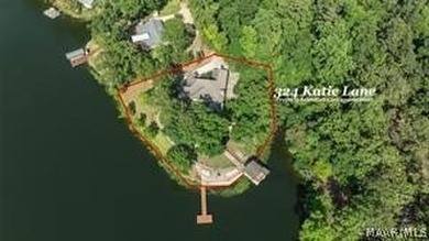 Experience elevated lakefront living on the pristine shores of - photo 6