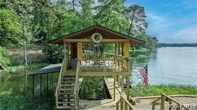 Experience elevated lakefront living on the pristine shores of - photo 7