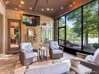 Experience elevated lakefront living on the pristine shores of - photo 8