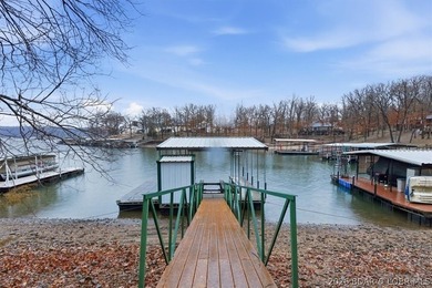 Discover this unique 2-bedroom, 1-bath lakefront cabin offering - photo 29