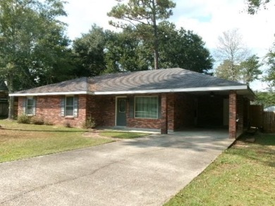 Lake Home For Sale in Carriere, Mississippi