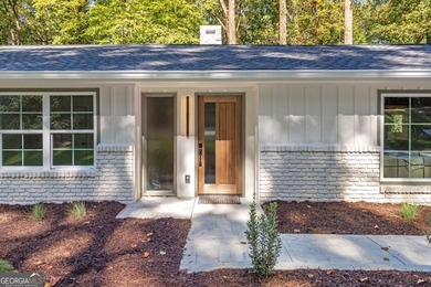 RARE ONE-ACRE OPPORTUNITY IN CHASTAIN PARK! Fully renovated and - photo 9