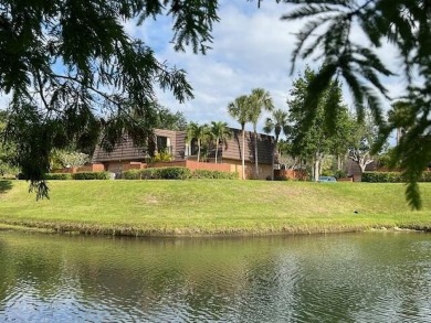 Lake Townhome/Townhouse For Sale in Jupiter, Florida