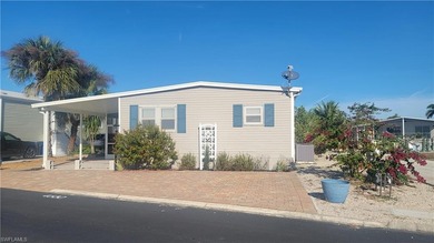 Lake Home For Sale in Bonita Springs, Florida