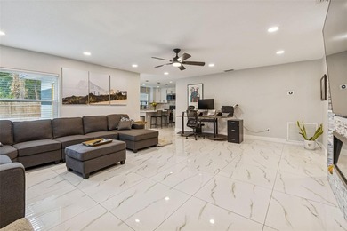 Welcome to this fully renovated 4-bedroom, 3-bathroom home - photo 8