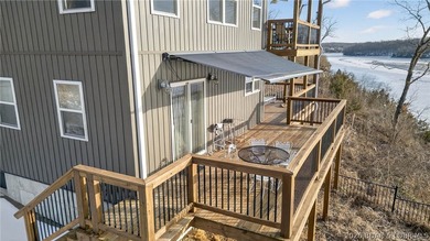 This 3-bedroom, 2.5-bath lakefront home offers over 2,000 square - photo 4