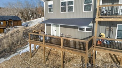 This 3-bedroom, 2.5-bath lakefront home offers over 2,000 square - photo 5
