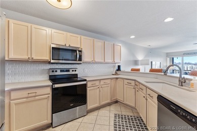 Experience Lake of the Ozarks living at its finest in this - photo 6